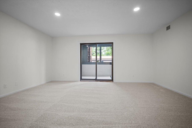 824 Mcgregor St Unit 4, Bloomington, IL 61701 - unfurnished room with carpet floors and recessed lighting