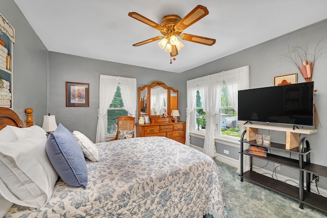 810 Glenwood Ave, Joliet, IL 60435 - bedroom with carpet, a ceiling fan, and baseboards