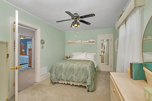 810 Glenwood Ave, Joliet, IL 60435 - carpeted bedroom featuring ceiling fan