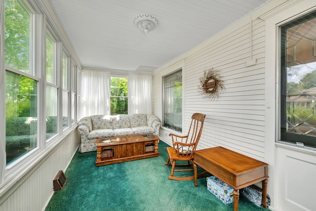 810 Glenwood Ave, Joliet, IL 60435 - sunroom / solarium with carpet and wood walls