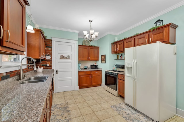 810 Glenwood Ave, Joliet, IL 60435 - kitchen featuring white fridge with ice dispenser, gas range oven, a sink, a chandelier, and brown cabinets