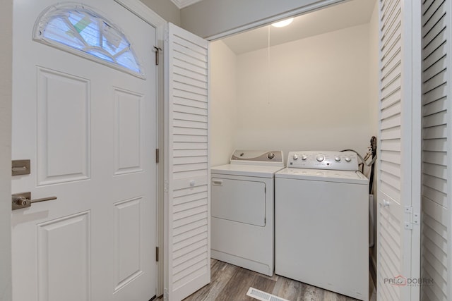 36586 N Traer Ter, Gurnee, IL 60031 - washroom with washing machine and dryer and wood finished floors