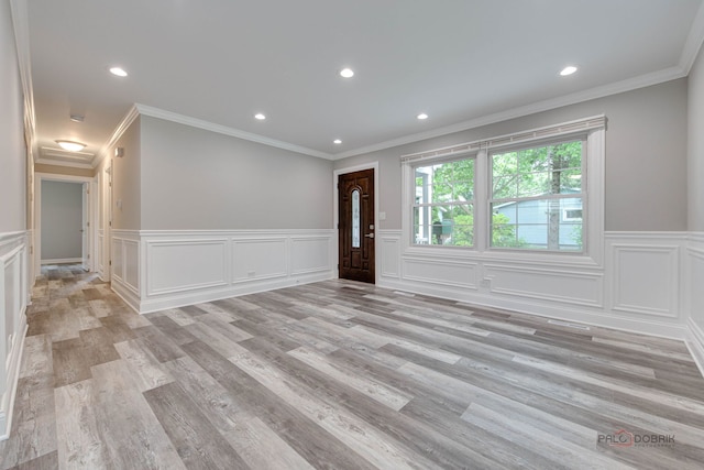 36586 N Traer Ter, Gurnee, IL 60031 - foyer with a wainscoted wall, ornamental molding, recessed lighting, and light wood-type flooring