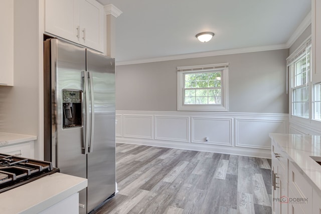 36586 N Traer Ter, Gurnee, IL 60031 - kitchen with stainless steel refrigerator with ice dispenser, crown molding, white cabinets, wainscoting, and light wood finished floors