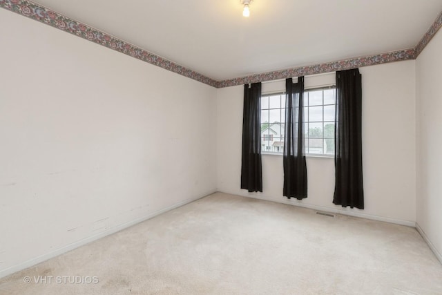 1714 Daybreak Ln, Zion, IL 60099 - carpeted empty room with baseboards