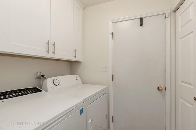 1714 Daybreak Ln, Zion, IL 60099 - washroom featuring washing machine and clothes dryer and cabinet space