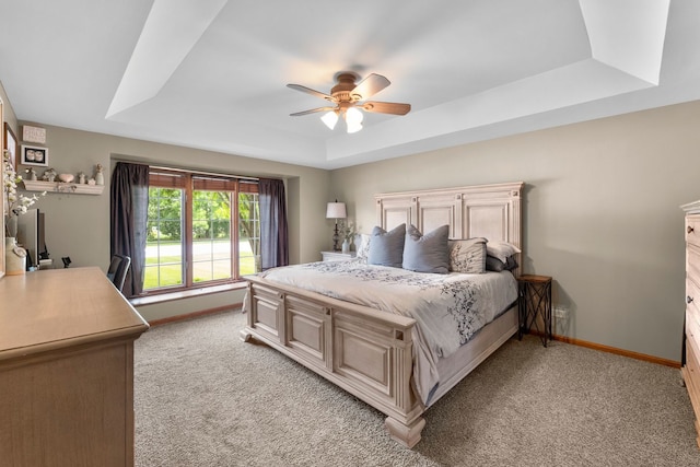 373 W Joliet Hwy, New Lenox, IL 60451 - bedroom featuring a tray ceiling, light carpet, and a ceiling fan