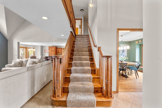 373 W Joliet Hwy, New Lenox, IL 60451 - stairway with healthy amount of natural light, a chandelier, tile patterned floors, and recessed lighting