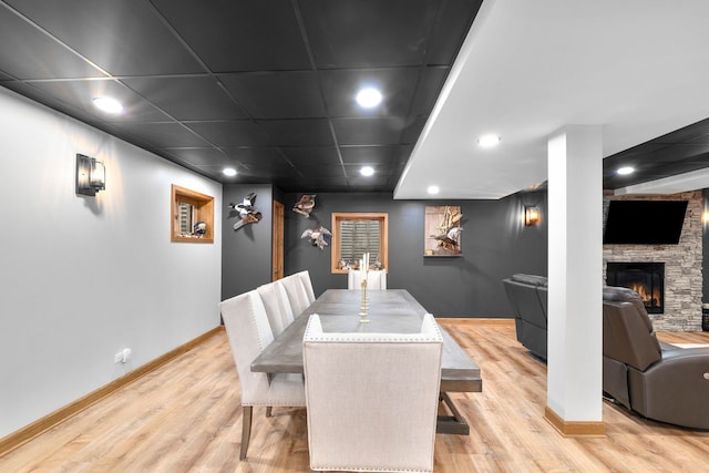 373 W Joliet Hwy, New Lenox, IL 60451 - dining area with recessed lighting, light wood-style floors, and a stone fireplace