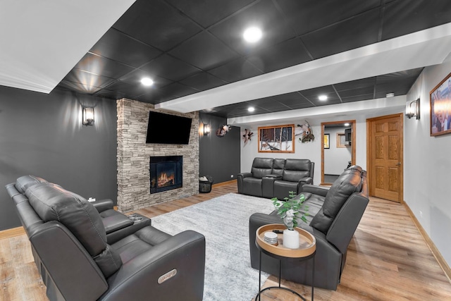 373 W Joliet Hwy, New Lenox, IL 60451 - living area featuring wood finished floors, a stone fireplace, and recessed lighting