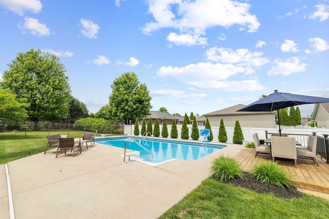 373 W Joliet Hwy, New Lenox, IL 60451 - view of pool featuring outdoor dining space, a wooden deck, a fenced backyard, a patio, and a diving board