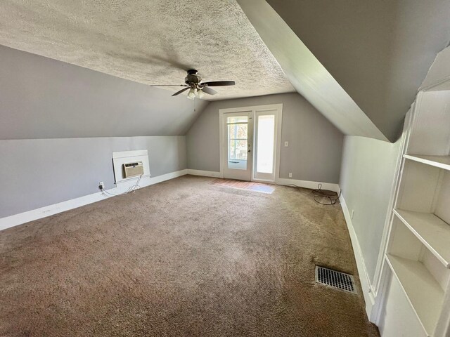 1303 W Locust St, Bloomington, IL 61701 - bonus room with a ceiling fan, carpet flooring, vaulted ceiling, baseboards, and heating unit