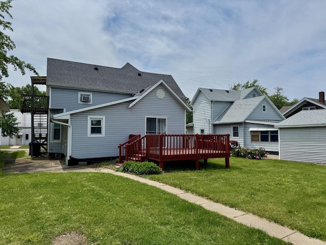 1303 W Locust St, Bloomington, IL 61701 - rear view of property with a wooden deck, a yard, and a shingled roof