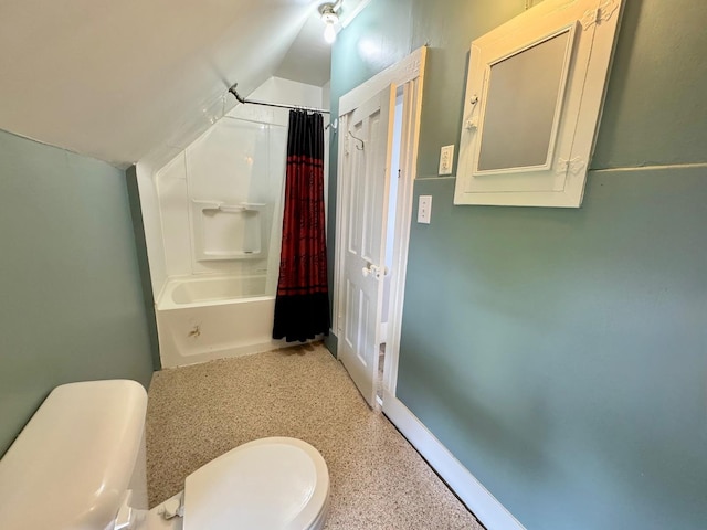 1303 W Locust St, Bloomington, IL 61701 - bathroom with toilet, lofted ceiling, and shower / bath combo with shower curtain