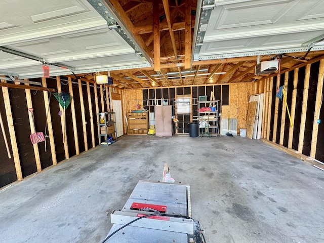 1303 W Locust St, Bloomington, IL 61701 - garage featuring a garage door opener