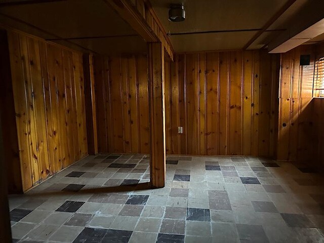2029 S 11th Ave, Maywood, IL 60153 - basement featuring tile patterned floors and wood walls
