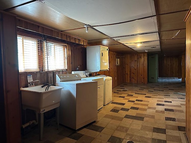 2029 S 11th Ave, Maywood, IL 60153 - washroom featuring light flooring, wood walls, and washing machine and clothes dryer