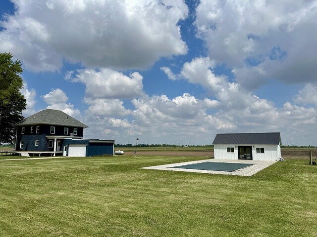 2034 Gittleson Rd, Rochelle, IL 61068 - view of grassy yard featuring an outbuilding