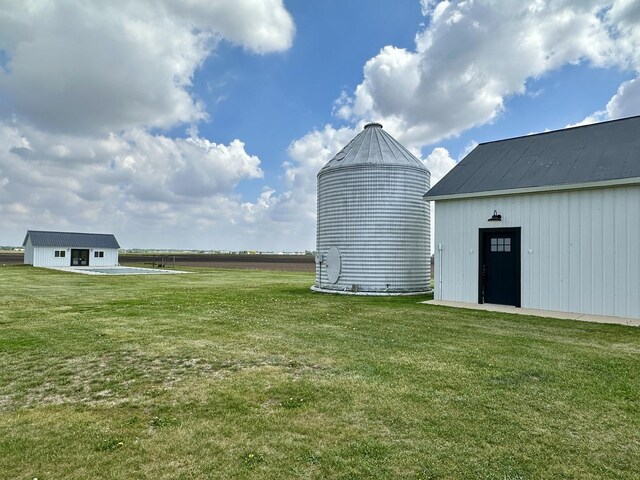 2034 Gittleson Rd, Rochelle, IL 61068 - view of green lawn with an outdoor structure