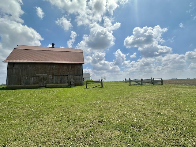2034 Gittleson Rd, Rochelle, IL 61068 - view of yard featuring a barn and an outbuilding