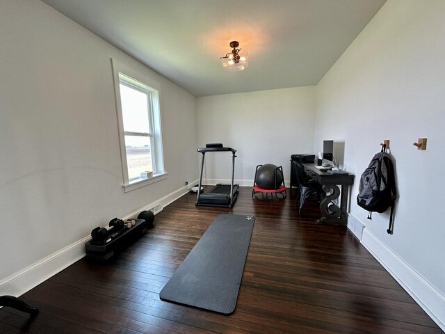 2034 Gittleson Rd, Rochelle, IL 61068 - exercise room featuring hardwood / wood-style floors and baseboards
