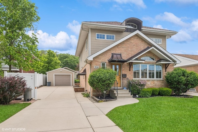 914 Meadowcrest Rd, La Grange Park, IL 60526 - view of front of property with an outbuilding, concrete driveway, brick siding, a garage, and stone siding
