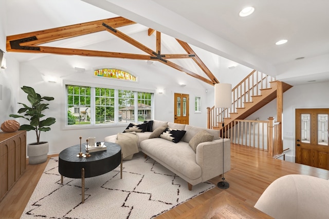 914 Meadowcrest Rd, La Grange Park, IL 60526 - living room with wood finished floors, beamed ceiling, recessed lighting, stairs, and high vaulted ceiling
