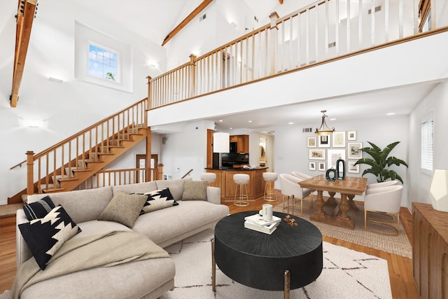914 Meadowcrest Rd, La Grange Park, IL 60526 - living area featuring high vaulted ceiling, light wood-type flooring, stairway, baseboards, and recessed lighting