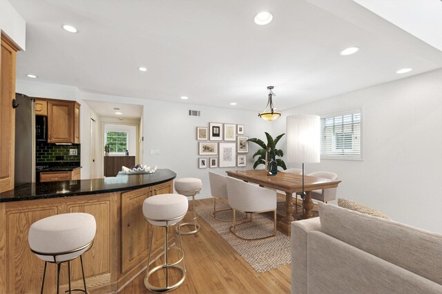914 Meadowcrest Rd, La Grange Park, IL 60526 - dining space featuring light wood-style flooring and recessed lighting