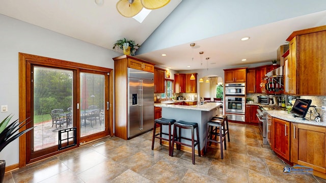 1535 S Douglas Ave, Arlington Heights, IL 60005 - kitchen featuring stainless steel appliances, a warming drawer, plenty of natural light, backsplash, and vaulted ceiling