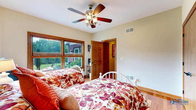 1535 S Douglas Ave, Arlington Heights, IL 60005 - bedroom with light wood-style floors and ceiling fan