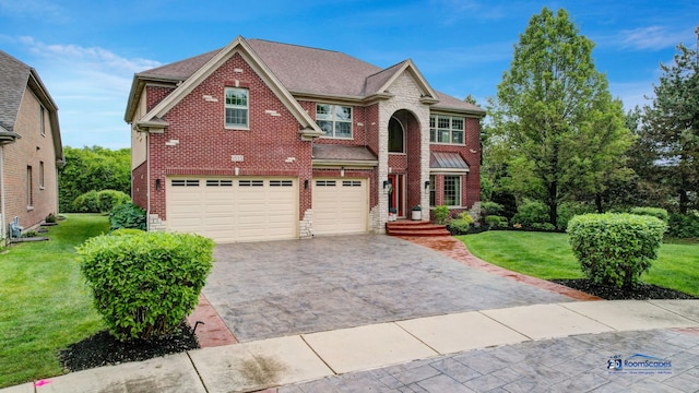 1535 S Douglas Ave, Arlington Heights, IL 60005 - view of front of property featuring brick siding, a garage, decorative driveway, a front yard, and roof with shingles