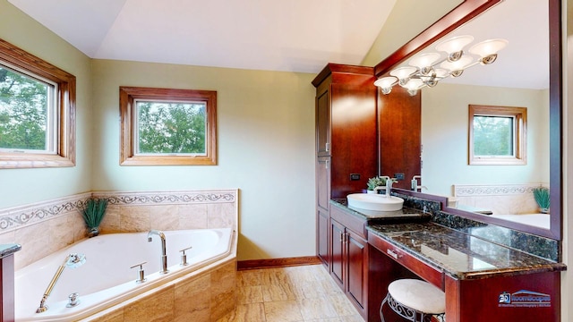 1535 S Douglas Ave, Arlington Heights, IL 60005 - bathroom with vaulted ceiling, vanity, and a garden tub