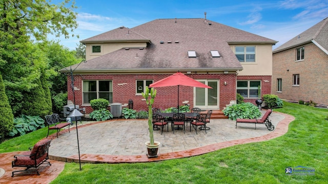 1535 S Douglas Ave, Arlington Heights, IL 60005 - rear view of house featuring brick siding, a yard, a shingled roof, and a patio