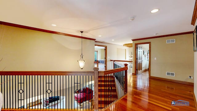 1535 S Douglas Ave, Arlington Heights, IL 60005 - hall featuring ornamental molding, recessed lighting, wood finished floors, and an upstairs landing