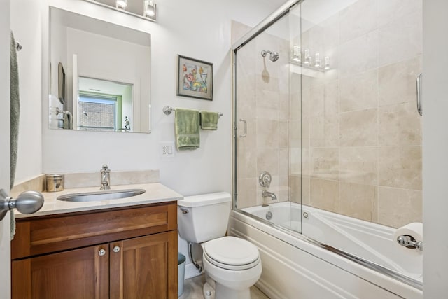 612 W Barry Ave Unit 3, Chicago, IL 60657 - full bathroom with vanity, toilet, and bath / shower combo with glass door