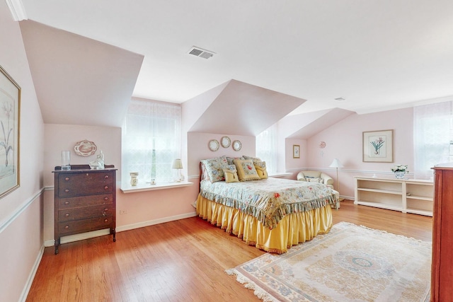140 N Quincy St, Hinsdale, IL 60521 - bedroom featuring multiple windows, wood finished floors, and vaulted ceiling