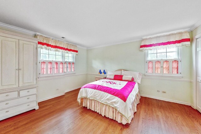 140 N Quincy St, Hinsdale, IL 60521 - bedroom with light wood-type flooring, baseboards, and ornamental molding