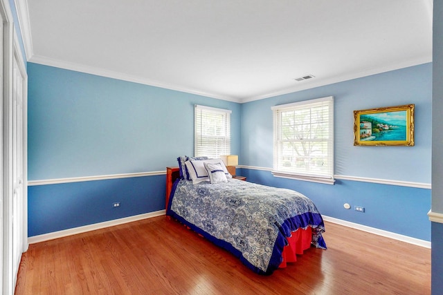 140 N Quincy St, Hinsdale, IL 60521 - bedroom with ornamental molding and wood finished floors
