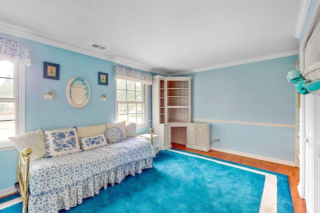 140 N Quincy St, Hinsdale, IL 60521 - bedroom with wood finished floors, ornamental molding, and baseboards