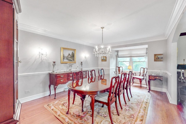 140 N Quincy St, Hinsdale, IL 60521 - dining room featuring a chandelier, light wood-style floors, crown molding, and baseboards