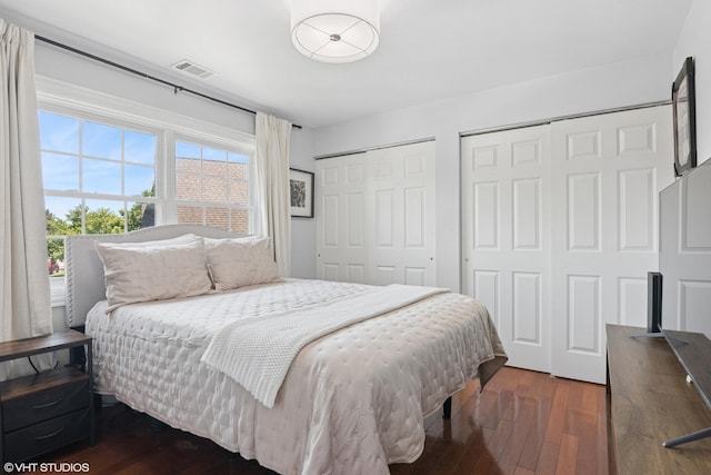 23 Foxcroft Rd Unit 235, Naperville, IL 60565 - bedroom with multiple closets and hardwood / wood-style floors