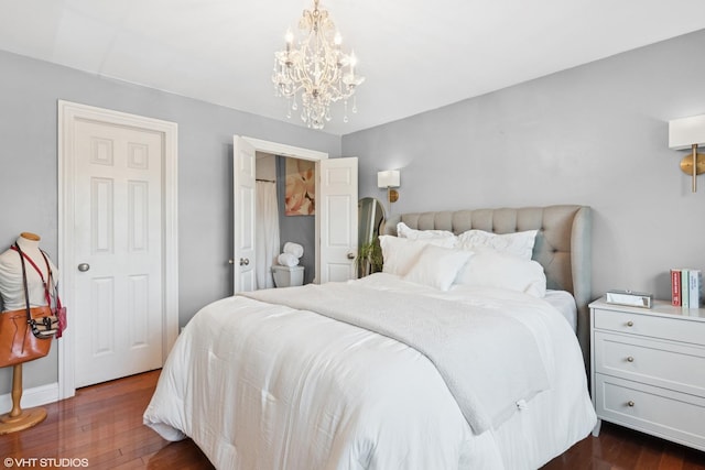 23 Foxcroft Rd Unit 235, Naperville, IL 60565 - bedroom featuring a chandelier and dark wood-style floors