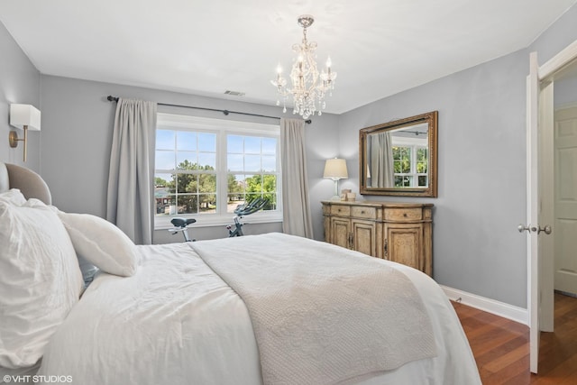 23 Foxcroft Rd Unit 235, Naperville, IL 60565 - bedroom with a chandelier and wood finished floors