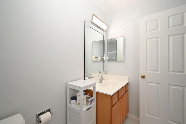 129 W Hampton Ct, Round Lake, IL 60073 - bathroom with vanity, toilet, and baseboards