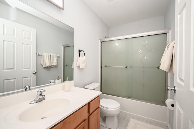 129 W Hampton Ct, Round Lake, IL 60073 - full bath with toilet, vanity, enclosed tub / shower combo, and tile patterned flooring