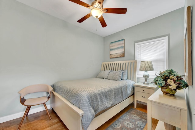 447 W 27th St, Chicago, IL 60616 - bedroom featuring wood finished floors, baseboards, and a ceiling fan