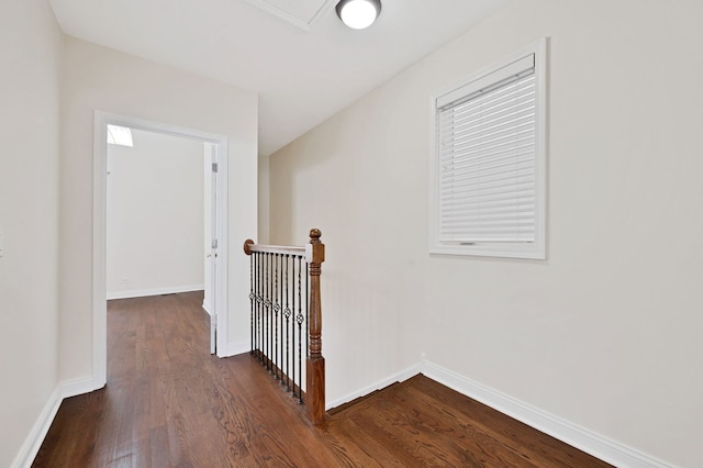 447 W 27th St, Chicago, IL 60616 - hallway with an upstairs landing, dark wood-type flooring, and baseboards
