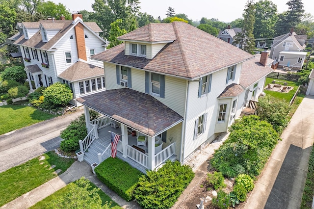 217 S Craig Pl, Lombard, IL 60148 - view of front of house with covered porch, a shingled roof, and a residential view