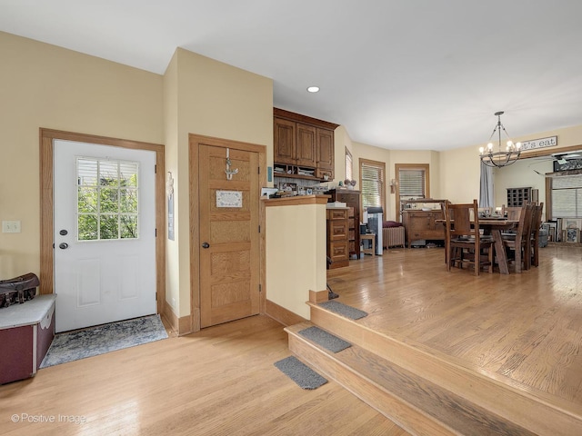 217 S Craig Pl, Lombard, IL 60148 - foyer with light wood-style floors, a chandelier, and recessed lighting